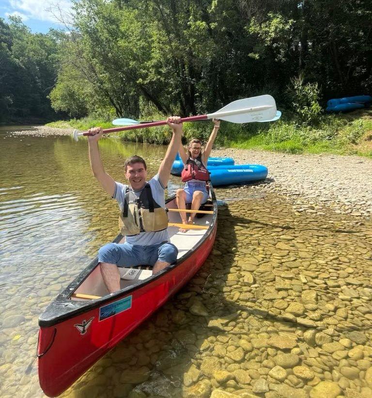 Nick and Maria outdoors in a canoe — Maria's Team Cleaning Company