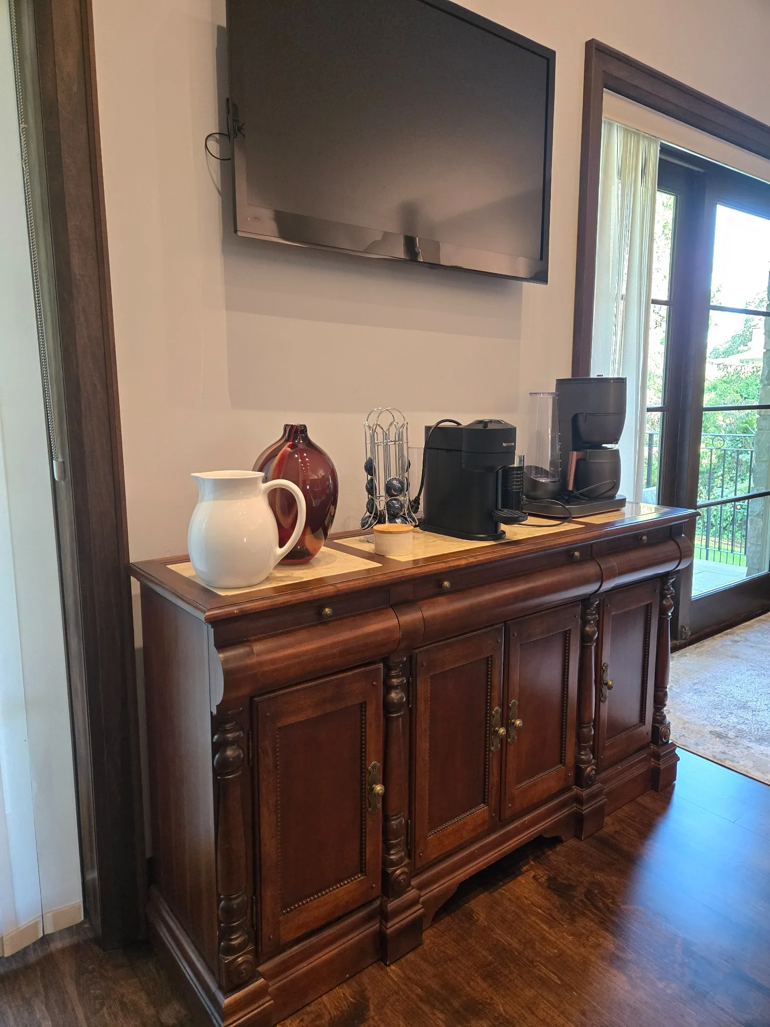 Coffee station area after renovation cleaning — appliances, surfaces, and surrounding areas cleaned and free of construction dust